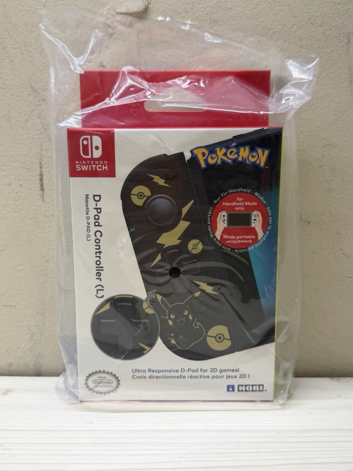 HORI D-Pad Controller (L) for Nintendo Switch - Pokémon Pikachu Black & Gold NEW HORI D-Pad Controller (L) for Nintendo Switch - Pokémon Pikachu Black & Gold NEW