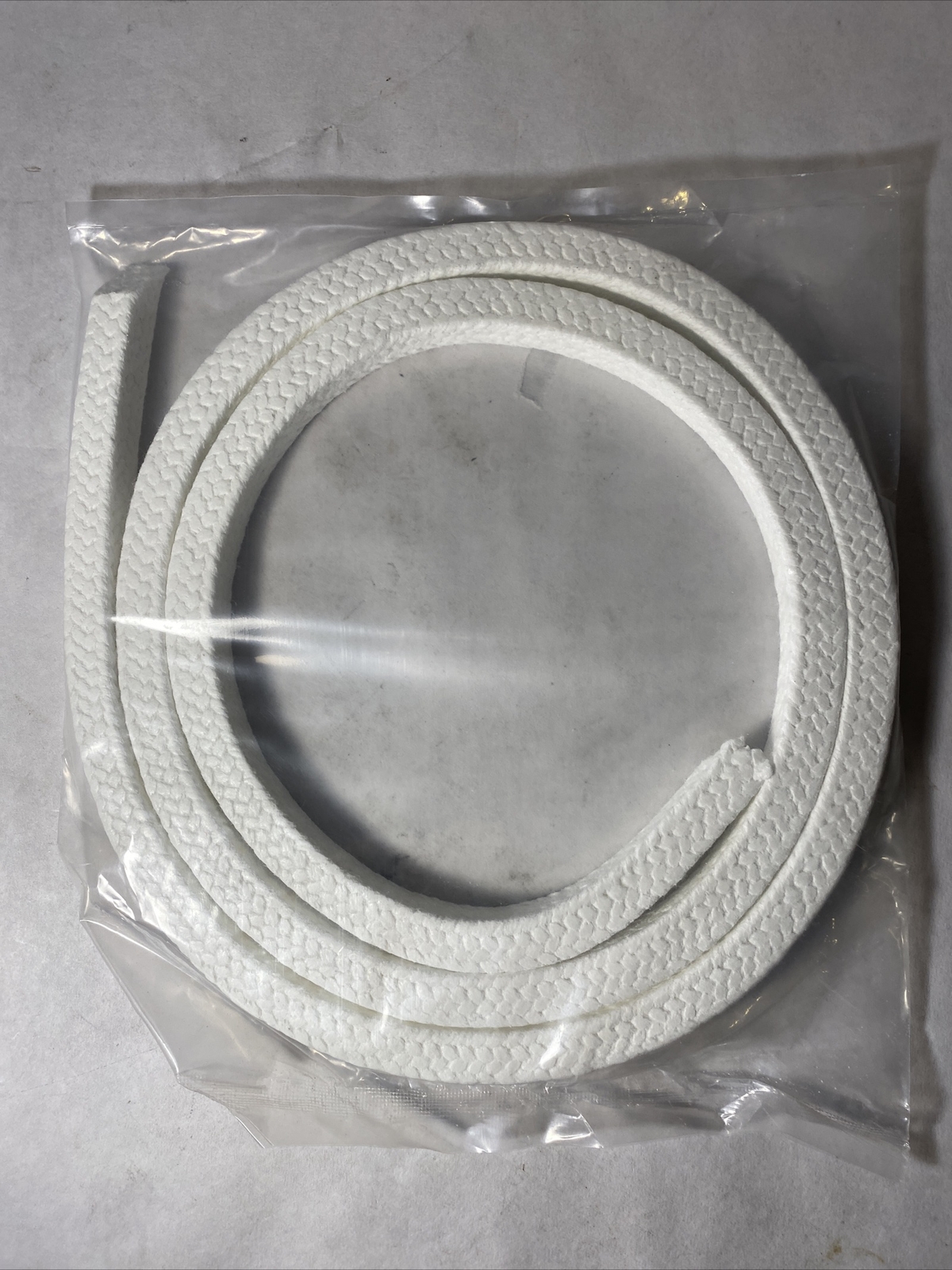 Teflon PTFE Square Braided Rope Packing 14mm Or 9/16” Sq x63” long weight 13oz Teflon PTFE Square Braided Rope Packing 14mm Or 9/16” Sq x63” long weight 13oz