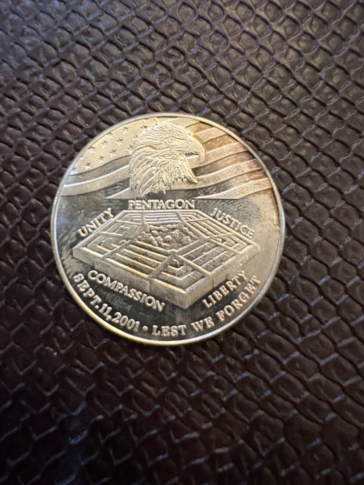 Sept Sept 11, 2001 Lest we forget, America Unites .999 silver coin Sept Sept 11, 2001 Lest we forget, America Unites .999 silver coin