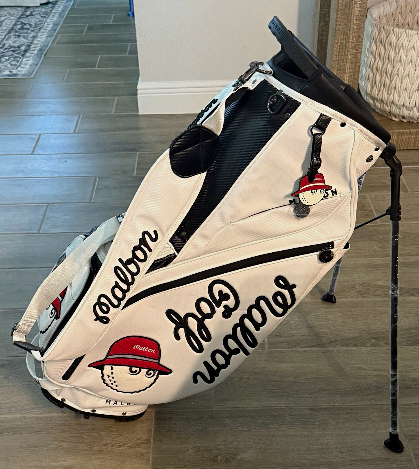 Malbon Golf Stand Bag 4-Way Divider White/Black/Red Zip Closure Malbon Golf Stand Bag 4-Way Divider White/Black/Red Zip Closure