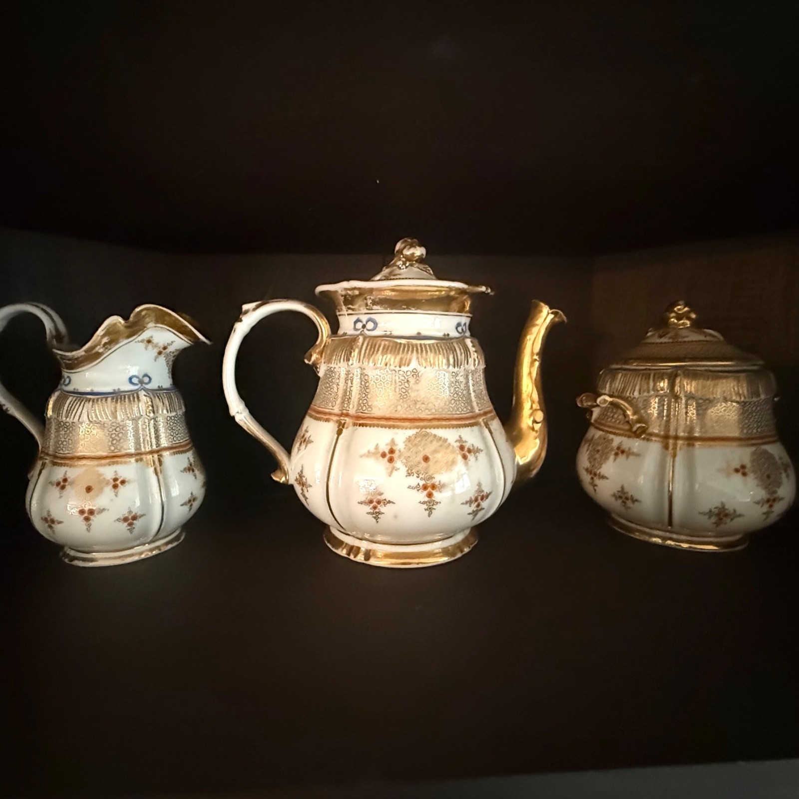 Porcelain tea set vintage ( 3 pieces ). Creamer, covered tea pot Porcelain tea set vintage ( 3 pieces ). Creamer, covered tea pot