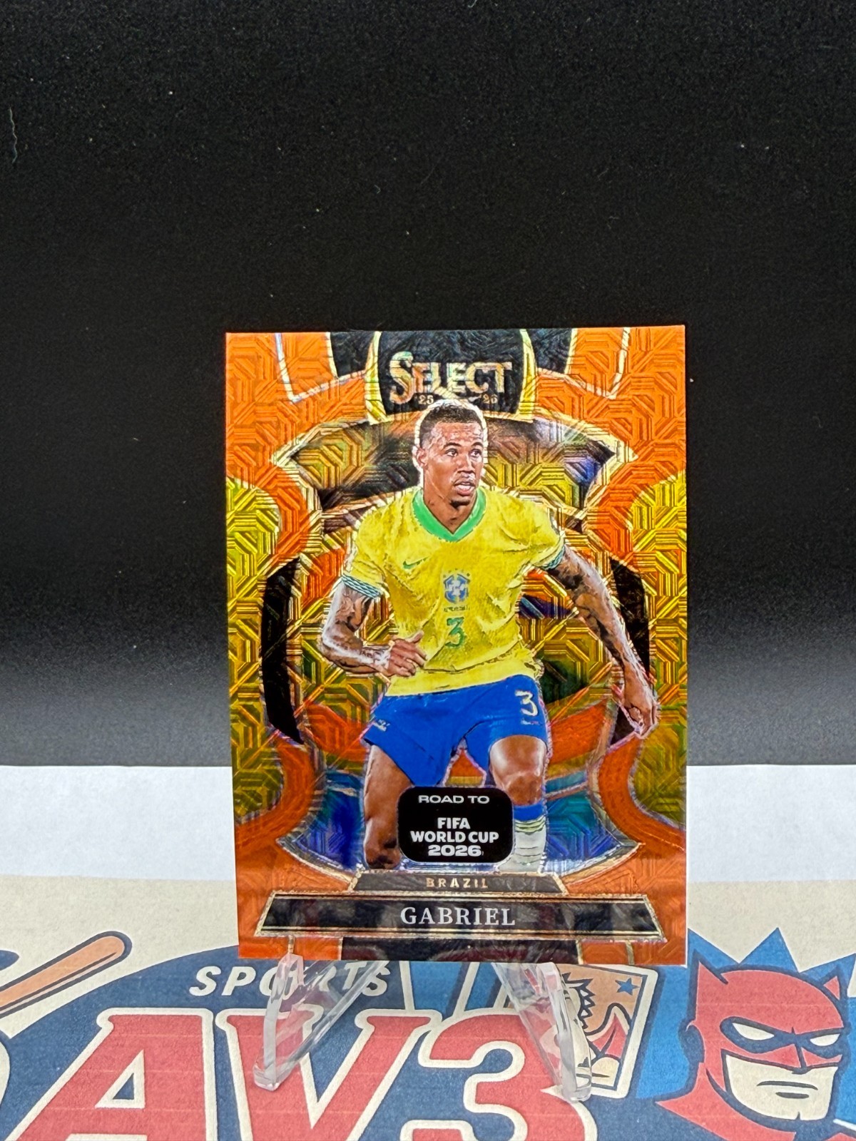 Gabriel 2025-26 Panini Select Road to the FIFA World Cup [Orange Mojo/825] #100