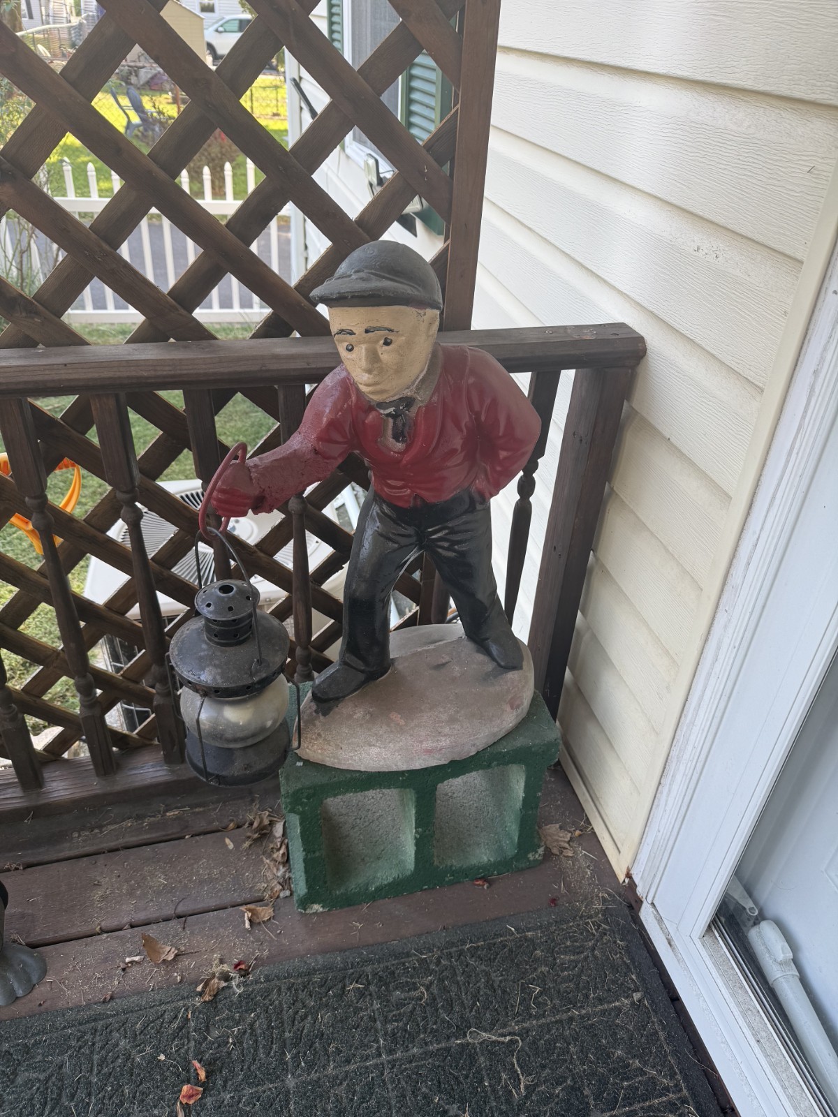 Antique American statue with lantern. Antique American statue with lantern.