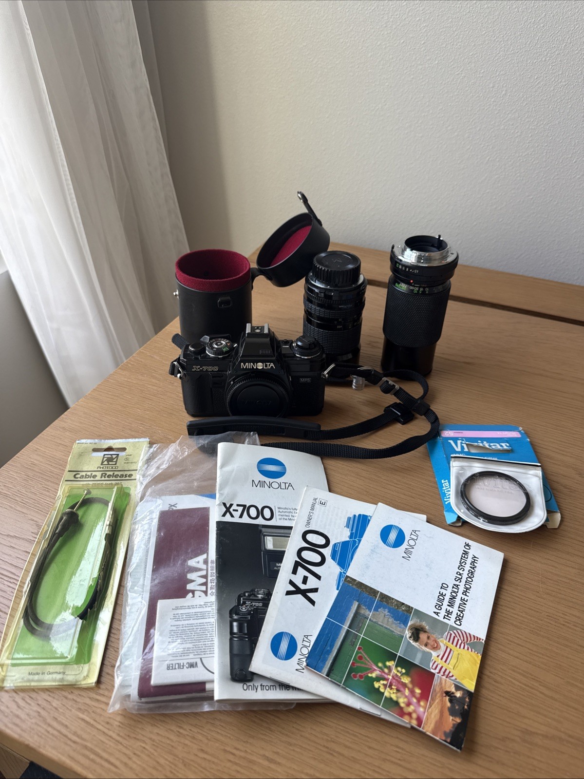 Minolta X-700 SLR Film Camera w/ 70-210mm & 35-70mm Lens And Extras Minolta X-700 SLR Film Camera w/ 70-210mm & 35-70mm Lens And Extras
