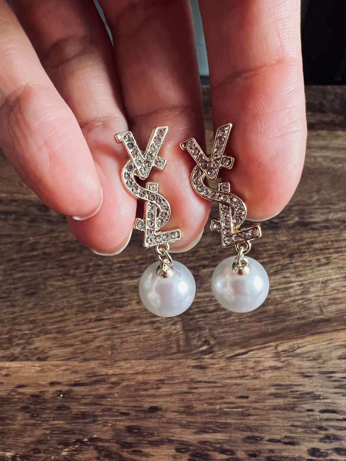 Vintage YSL-style statement earrings with logo in pre-owned condition