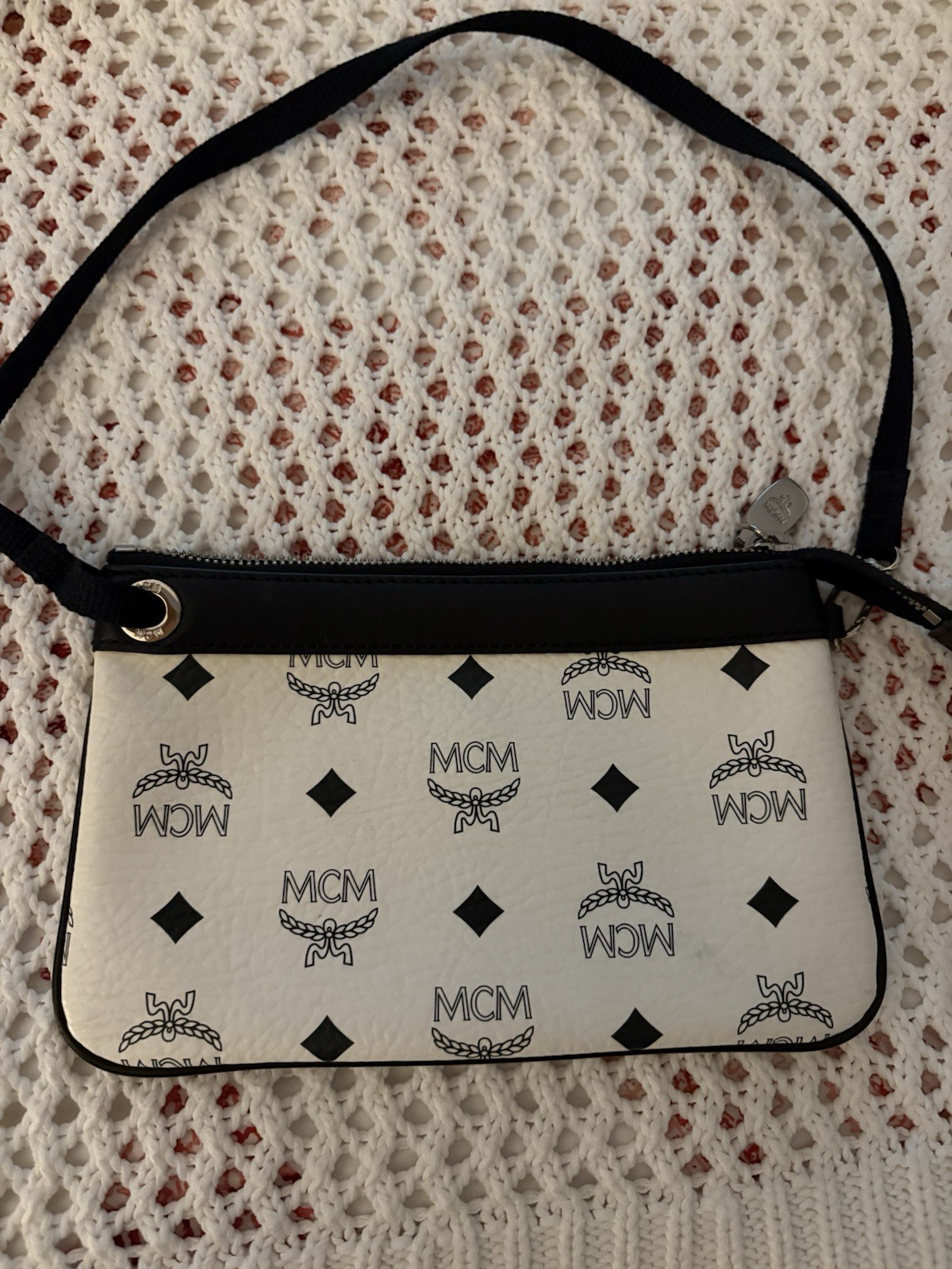 MCM White & Black Logo wristlet.Used MCM White & Black Logo wristlet.Used