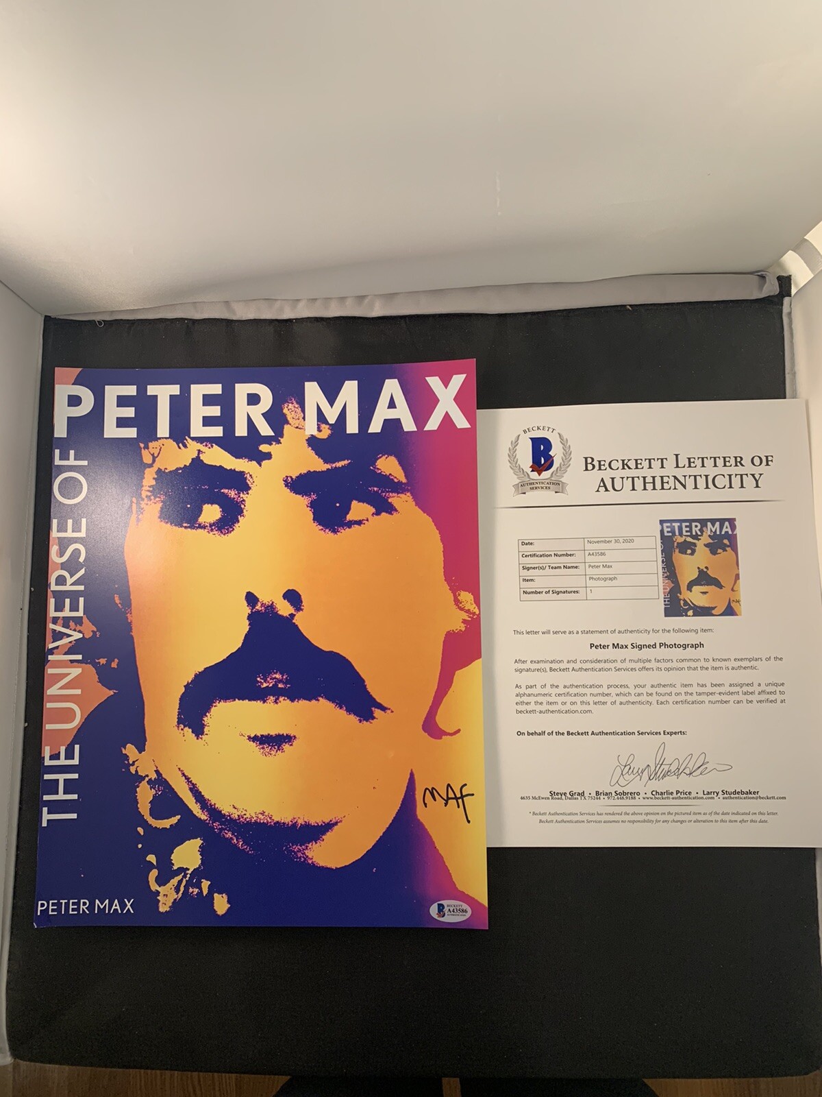 Peter Max Signed 11x14 Photo BAS COA Autograph #A43586 Peter Max Signed 11x14 Photo BAS COA Autograph #A43586