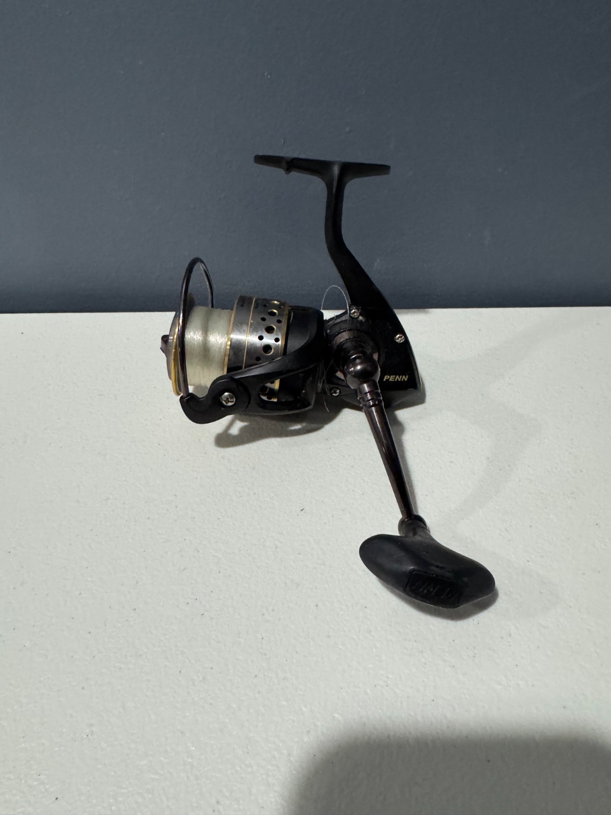 Penn Battle 4000 HT-100 Spinning Fishing Reel In Shore Black and Gold Metal Penn Battle 4000 HT-100 Spinning Fishing Reel In Shore Black and Gold Metal