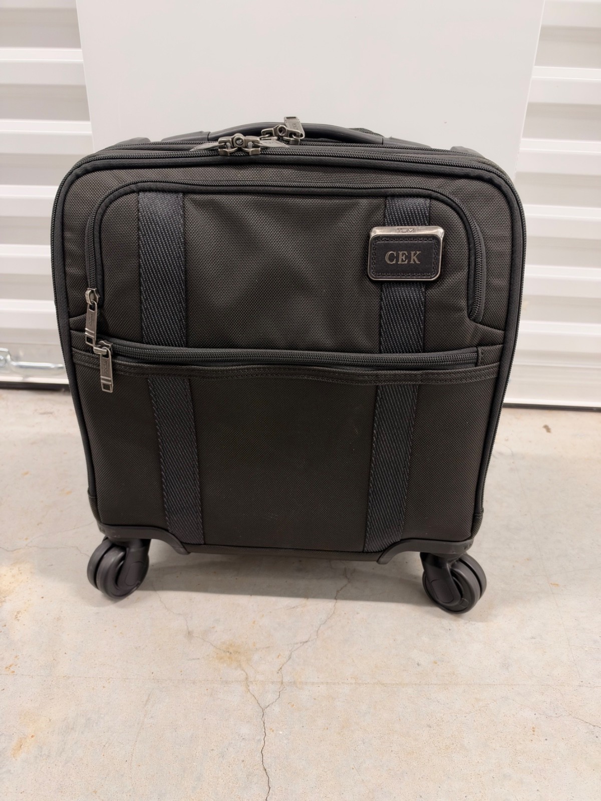 TUMI Merge 131311 Small Compact 4-Wheel Rolling Laptop Briefcase Black TUMI Merge 131311 Small Compact 4-Wheel Rolling Laptop Briefcase Black