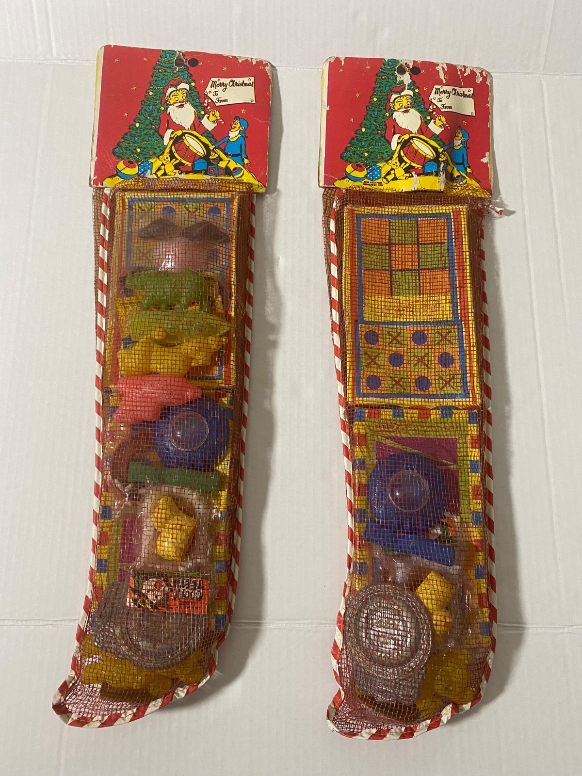 Vintage 1970's Dime Store Toy Filled Mesh Christmas Stockings Set of 2 Vintage 1970's Dime Store Toy Filled Mesh Christmas Stockings Set of 2