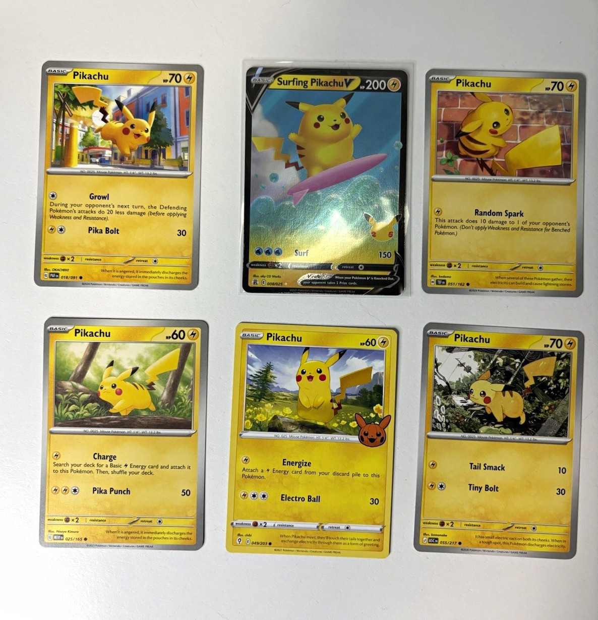 Pokémon TCG Pikachu 6-Card Lot English Holo/Regular Surfing Pikachu V Pokémon TCG Pikachu 6-Card Lot English Holo/Regular Surfing Pikachu V