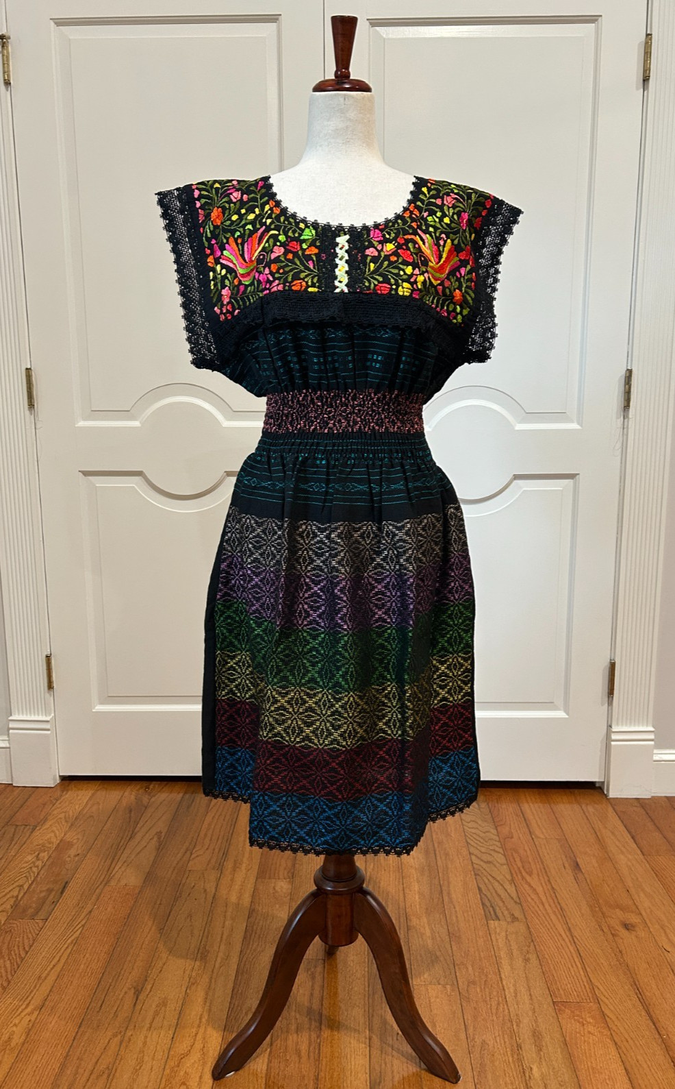 Mexican Paloma dress made of handwoven fabric with 100 % handmade embroidery.