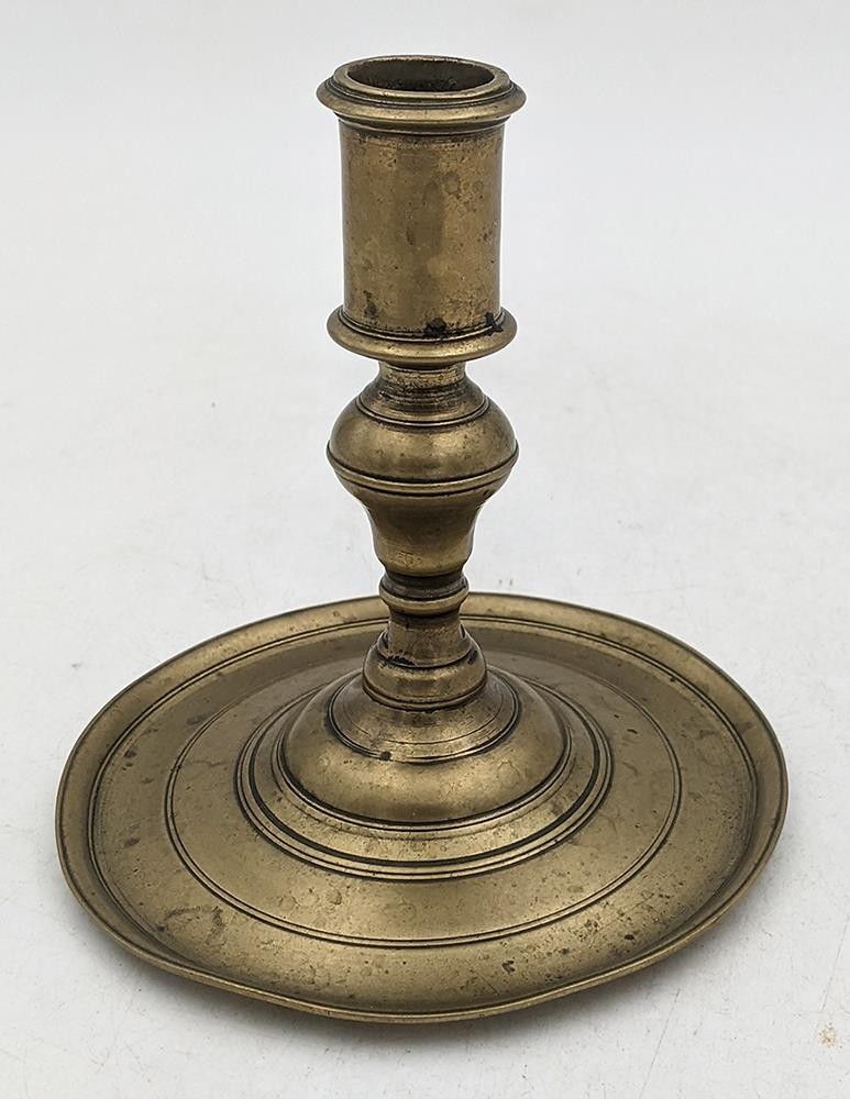 17TH CENTURY TURNED BRASS CANDLESTICK