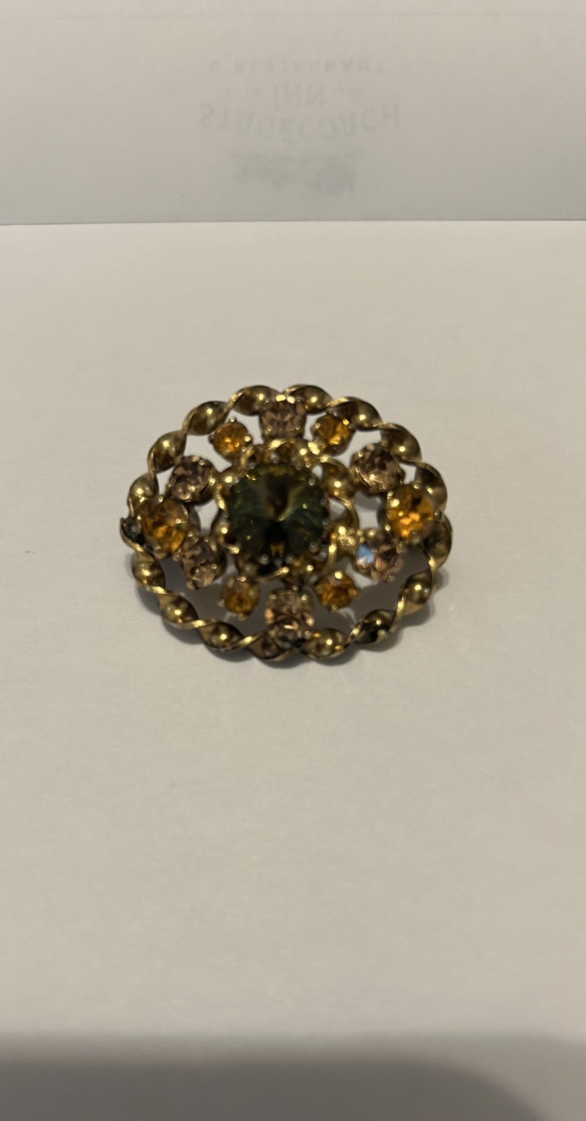 Vintage Made In Austria Golden Rhinestone Brooch w/Orange, tan and brown stones Vintage Made In Austria Golden Rhinestone Brooch w/Orange, tan and brown stones