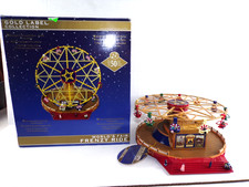 RARE 2010 MR CHRISTMAS GOLD LABEL COLLECTION WORLDS FAIR FRENZY RIDE. Mint picture