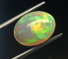 Wonderful Green Red Balls Around Oval Opal 7.47ct   Loose Gemstone picture