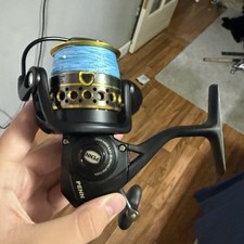 Penn Battle II 3000 Spinning Reel Black/Gold 6.2:1 5BB Front Drag Blue Line picture