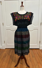 Mexican Paloma dress made of handwoven fabric with 100 % handmade embroidery. picture