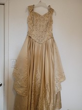 Elegant champagne-gold formal ballgown features a laced Corset✨ picture