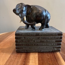 vintage Robson cast iron elephant on stack of books bookend. picture