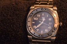 Croton CA301130 Automatic Stainless Blue Dial 10ATM Exhibition Back picture
