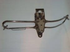 GENUINE SUZUKI NOS FRONT FENDER MOUNT BRACKET picture