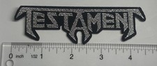 Testament Metallic Silver Logo Black Border Woven Patch picture