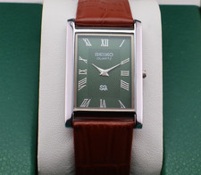 Vintage Seiko Slim Quartz Men's Wrist Watch Green Dial with Light Brown Strap. picture