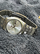 Seiko 5 Automatic Sunburst Silver Dial Day/Date 37mm Steel Bracelet picture