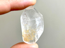 Natural phantom crystal lodolite quartz glittering golden inclusion, rainbows picture