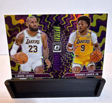 24/25 Panini Donruss Optic Optical Illusions LeBron+Bronny James #2 Purple Prizm picture