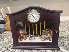 Mr. Christmas  Gold Label Animated Musical Chimes Skaters picture