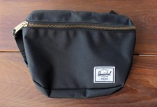Black Herschel fanny pack/belt bag with red stripe lining picture