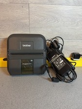 Brother RuggedJet RJ-4040-K - 4-Inch Label, Tag, and Receipt Printer Read picture
