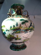Chinese Famille Rose Porcelain Vase with figurine picture