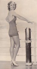 1937 Press Photo Leggy Actress Madge Evans Models Bathing Suit for MGM Studio picture