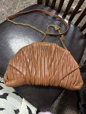 kate spade croissant purse picture