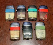 Lot of SEVEN (7) Vintage Scripto Lighters. Two - New York World’s Fair 1964-62 picture