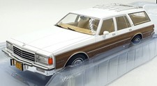 MCG 1/18 Scale Diecast MCG18475 - 1985 Chevrolet Caprice Estate Wagon - White picture