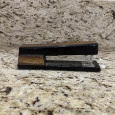 Vintage Woodgrained Swingline Stapler With Top Damage. picture
