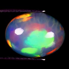 4.13 ct Premium Oval Cabochon (13 x 10 mm) Ethiopian Flashing Rainbow Opal picture
