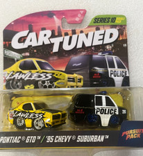CAR TUNED DOUBLE PACKS new =  series 10 ='69 PONTIAC GTO  & '95 CHEVY SUBURBAN picture