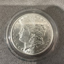 1884 morgan silver dollar carson city AU-58 picture