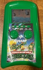 Original Vintage Teenage Mutant Ninja Turtles Konami Handheld Game Working picture