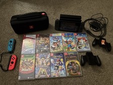 Nintendo Switch Bundle 9 Games and Extra Joy Cons picture
