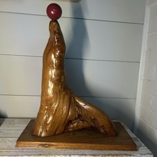 Vintage Drift Wood Folk Art Seal With Red Ball picture