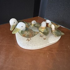 Vintage Hand Carved Stone Duck Family Resting on Polished Slab Base picture