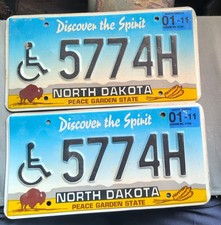 2 Vintage 2001 NORTH DAKOTA  Handicapped License Plates 5774H picture