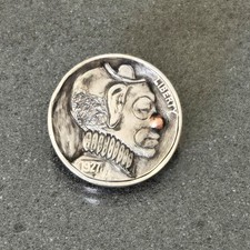 1927 Buffalo nickel carved into a clown with copper nose hobo nickel picture