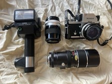 Nikon F Black 35mm SLR Film Camera w/ 50mm f/1.4, 135mm f/2.8, Flash picture